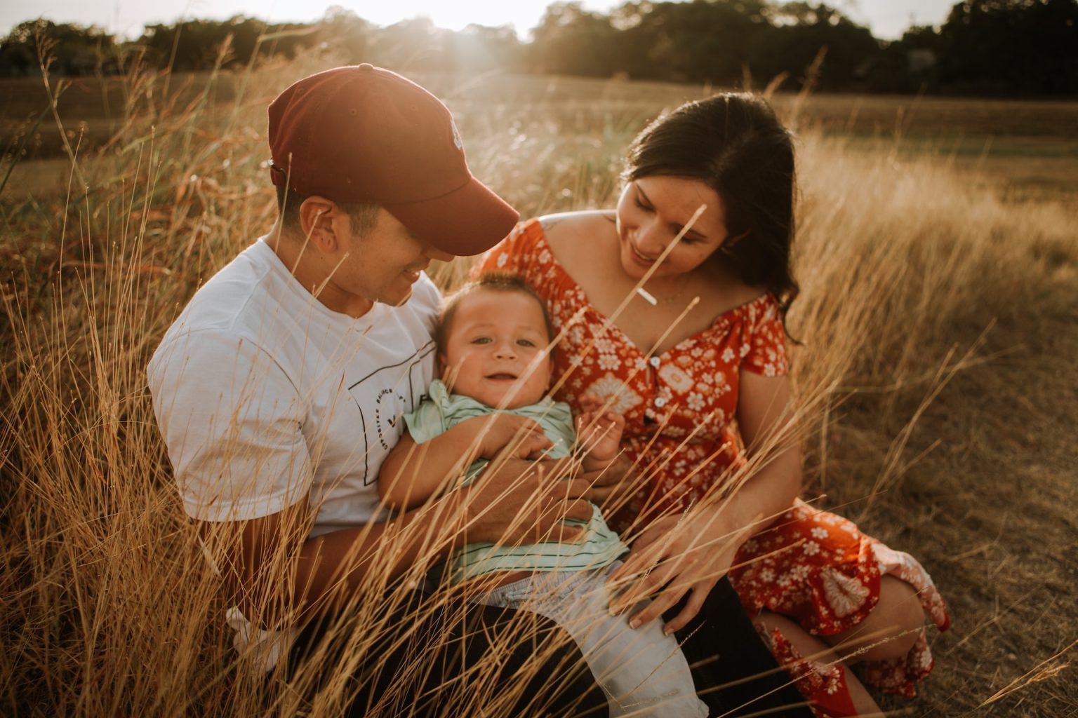 Young expectant couple reviewing personal loan options for family and IVF expenses